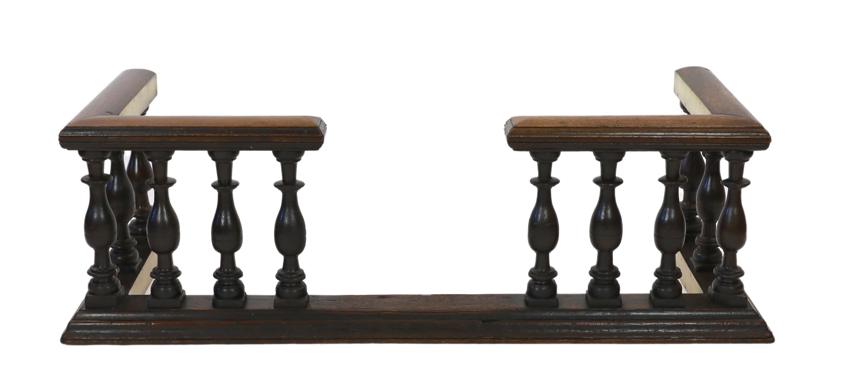 A 19th century brass mounted oak club fender, width 182cm depth 69cm height 58cm